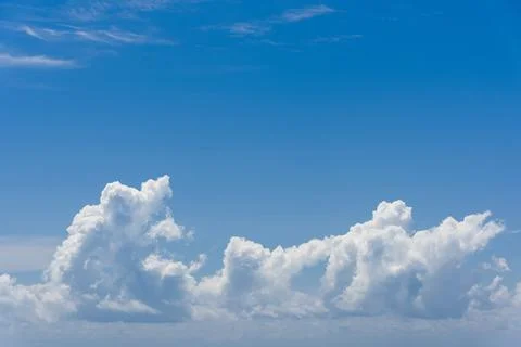 Clear blue sky with white clouds Stock Photos