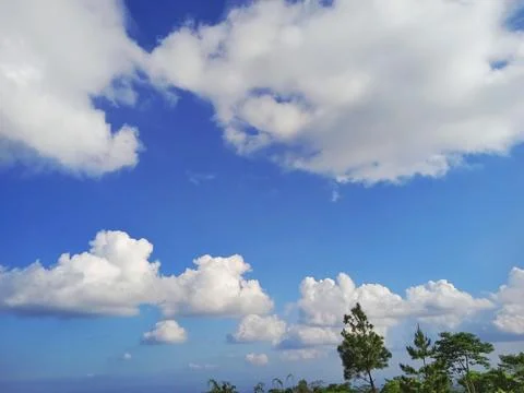 Clear blue sky with white clouds Stock Photos