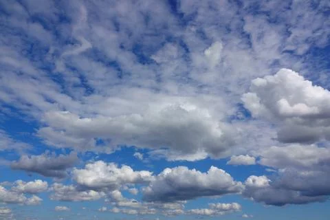 Clear blue sky with white clouds Stock Photos
