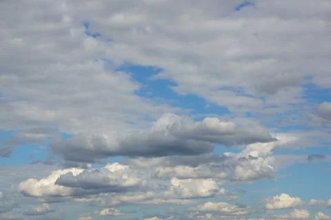 Clear blue sky with white clouds Stock Photos