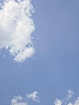 Clear blue sky white clouds Stock Photos