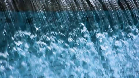 Clear blue water flowing down textures Stock Footage 105179296