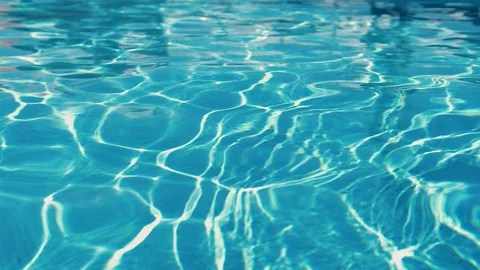 Clear blue water with sun highlights, texture Stock Footage 102660866