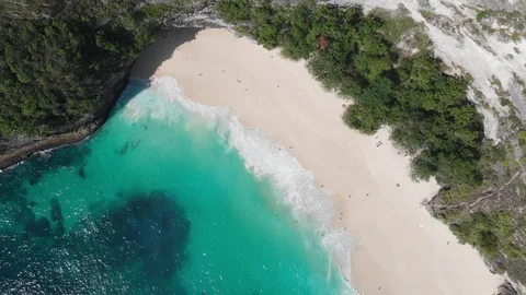 Clear blue water, waves washing the sandy shore. Stock Footage 119155265