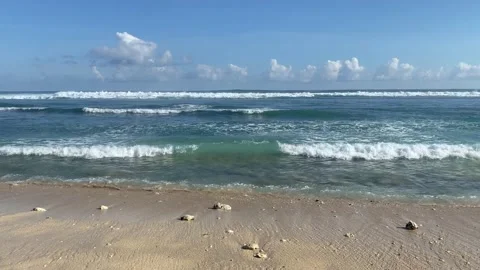 Clear blue waves on a white beach in Bali Stock Footage 202636416