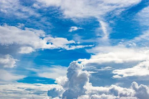 Clear bright blue sky with cloud pattern at evening Stock Photos