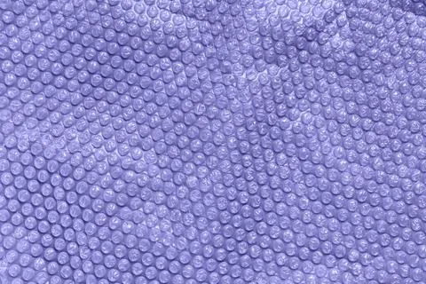 Clear bubble foil for wrapping, texture background, toned in trendy color of the Foto stock