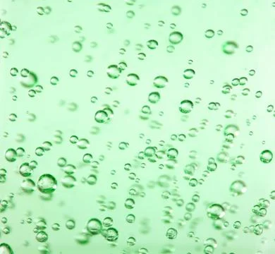 Clear bubbles in green gel Stock Photos