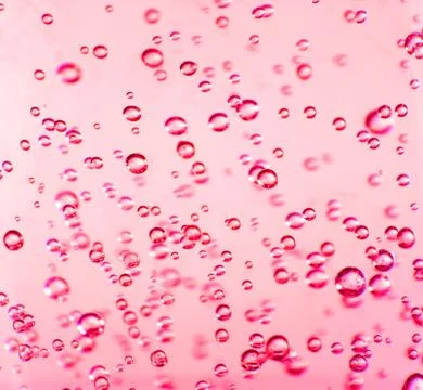 Clear bubbles in red gel Stock Photos