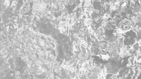 Clear bubbling water surface with ripples, waves and dynamic liquid texture Stock Footage 343559554