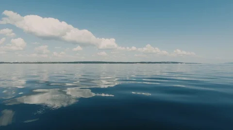 Clear calm sea and the reflection of clouds in the water-1 Stock Footage 113124765