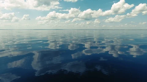 Clear calm sea and the reflection of clouds in the water-2 Stock Footage 113124782