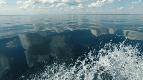 Clear calm sea and the reflection of clouds in the water Stock Footage 113124821