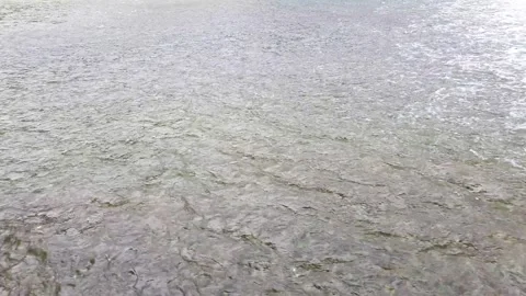 Clear, clean white bubbles of water flowing away Stock Footage 145711700