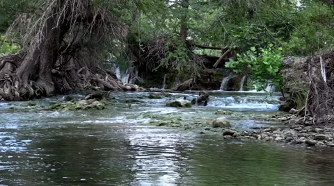 Clear cold river with falls near Utopia Texas Stock Footage 53340833