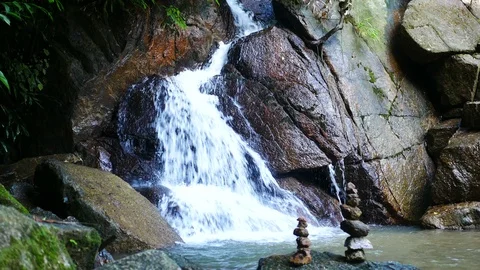 Clear cold  waterfall flow into rock , blurred defocus stone sort successful Stock Footage 95658126