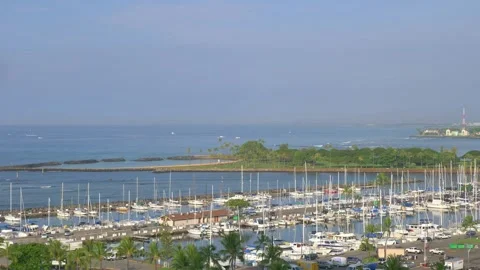 Clear day time-lapse at Honolulu marina, showcasing the busy boat docks in 4k Stock Footage 281473658