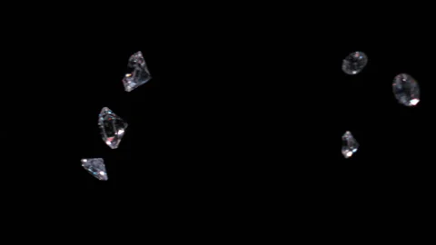Clear Diamonds fall in slow motion 4K Stock Footage 253157470