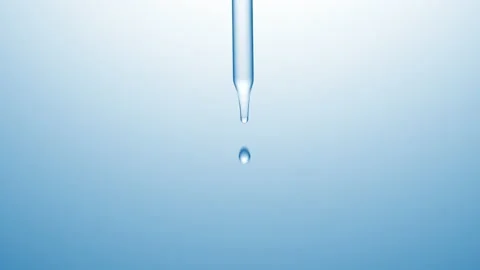 Clear drops are falling down from chemical dropper Stock Footage 167162938