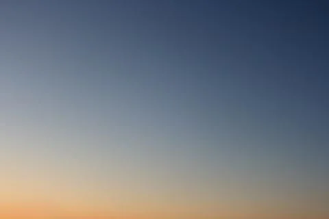 Clear evening sky without clouds. Sky as background or gradient. Stock Photos