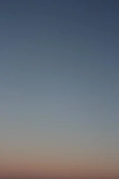 Clear evening sky without clouds. Sky as background or gradient. Stock Photos