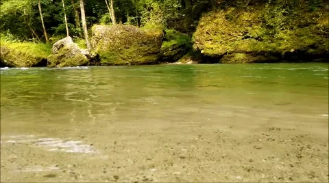Clear flowing water of the mountain river inside the gorge. Stock Footage 65404132