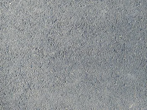A clear gray background with the texture of asphalt or concrete Stock Photos