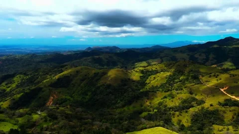 Clear green mountain lake surrounded by dense forest Stock Footage 340963078
