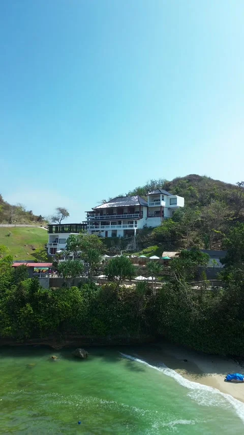 Clear green waters at Teluk Asmara Beach vertical view August 3 2026 Video stock 342133292