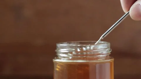 Clear Honey Dripping Stock Footage 7734075