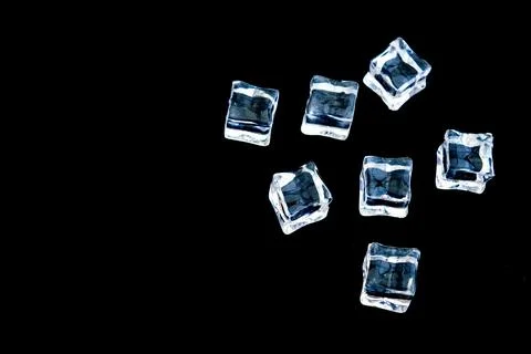 Clear ice in cube shape.Fake or Artificial acrylic or plastic ice cubes. Stock Photos