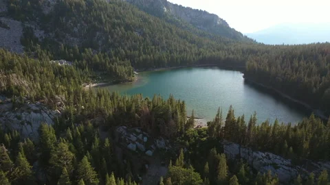 Clear lake near the mountainside Stock Footage 143003232