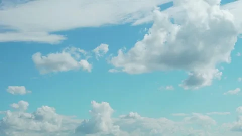 Clear Light Blue Sky and Fluffy White Clouds on Sunny Day Time Laspe Slow Motion Video stock 314716103