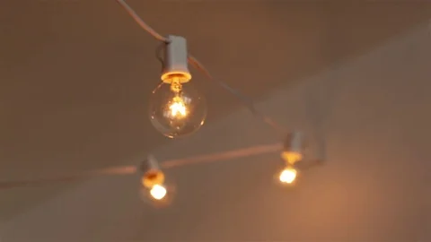 Clear Light Bulb String Shines Stock-Footage 73362049