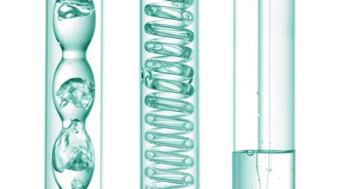 Clear liquid with bubbles in bulb condenser white background Stock Footage 337139694
