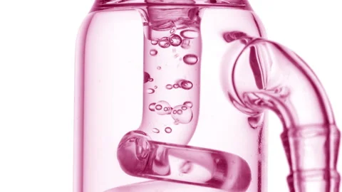 Clear liquid bubbles condense in glass tube white background Stock Footage 340499755