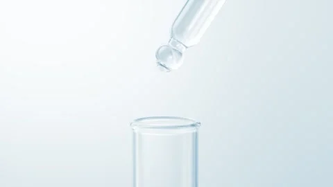Clear liquid drop falling from pipette into test tube for science experimen.. Video stock 332389670