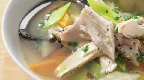 Clear lobster broth with garnish Stock Footage 24662960