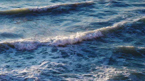 Clear mediterranean sea with waves driven by wind at sunset in Corfu Greece. Stock Footage 279555720