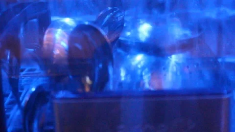 The clear model of a running dishwasher. Inside a dishwasher. Cutaway. Stock Footage 95798571