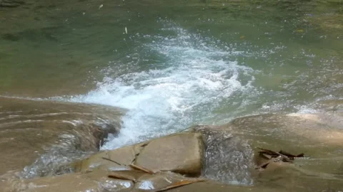 A clear mountain river cascade Stock-Footage 321325820