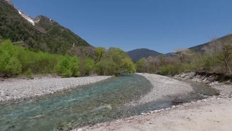 Clear Mountain River Flowing Through Kamikochi Valley, Japanese Alps Stock Footage 329773630