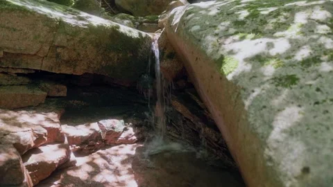 Clear Mountain Stream Flowing Through Rocks 03 - Water Flow Видео 342463140