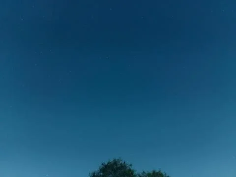 The clear night sky is visible with small stars taken in the Bogor. Stock Photos
