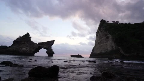 Clear ocean water flows past rocks Stock Footage