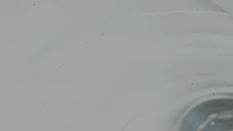 Clear Oil Pouring Macro Stock Footage 77780366