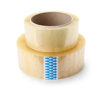 Clear packaging tape rolls stacked for shipping and moving supplies, isolated Stock Photos