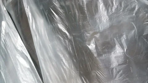 Clear plastic sheet blowing in the wind ... | Stock Video | Pond5