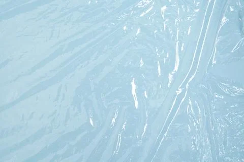 Clear plastic texture with blue color. Nylon polythene wrap. Plastic free Stock Photos