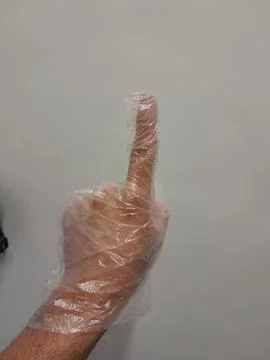Clear polyethylene gloves on hand for light duty protection Stockfoto's